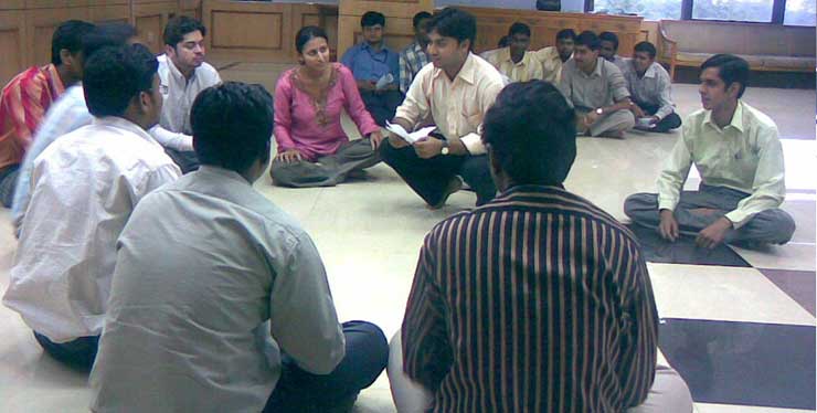 A participant is communicating to a group of participants